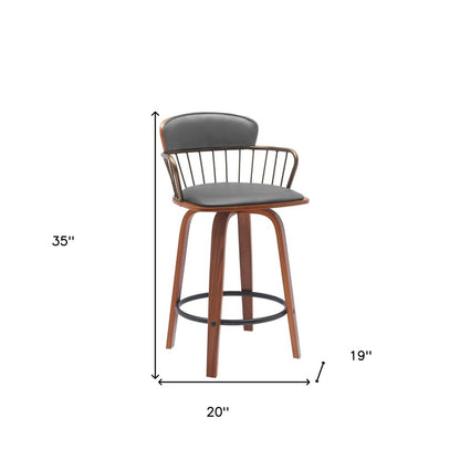 26" Gray And Brown Faux Leather And Fabric And Wood Low Back Counter Height Swivel Bar Chair