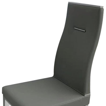 Set of Four Dark Gray And Silver Faux Leather And Wood Dining Side Chairs