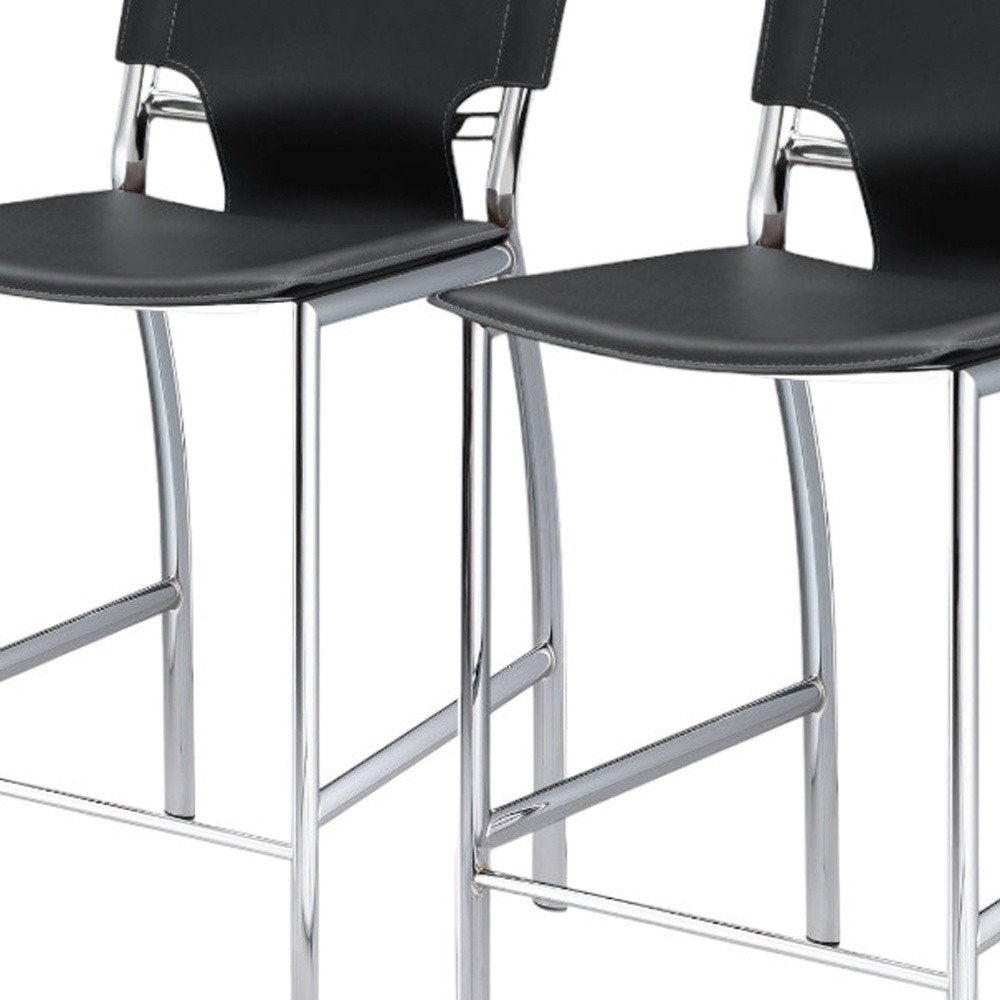 Set of Two 29" Black And Silver Faux Leather And Metal Low Back Bar Height Bar Chairs