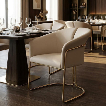 Beige and Gold Faux Leather and Metal Partially Open Back Dining Arm Chair