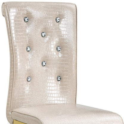 Set of Four Beige And Gold Tufted Faux Leather And Metal Dining Side Chairs