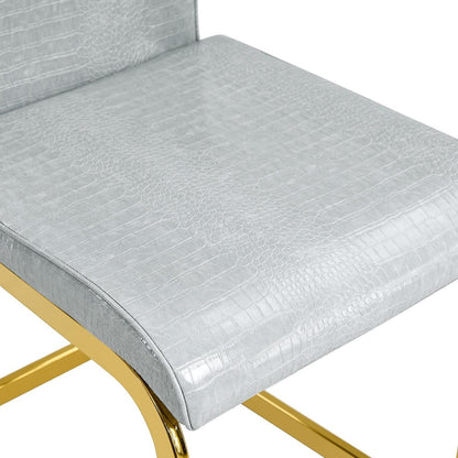 Set of Two Gray And Gold Tufted Faux Leather And Metal Dining Side Chairs