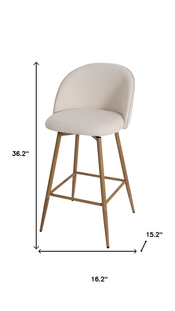 27" Beige And Oak Fabric And Metal Low Back Counter Height Swivel Bar Chair